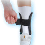 A person wearing an ankle brace for ankle instability.